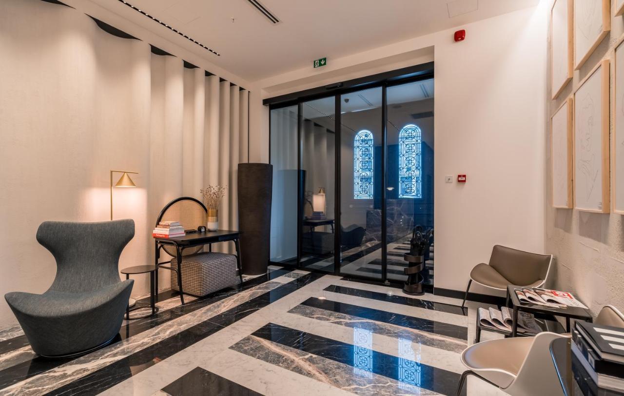 Monograph Freedom Square Hotel Tbilisi Exterior foto The lobby of the hotel